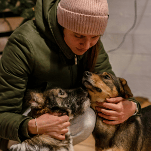 Shoreline Happy Paws dog walker with two dogs in Old Saybrook, CT