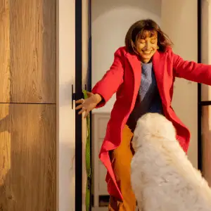 woman coming home to her dog in Old Saybrook, CT