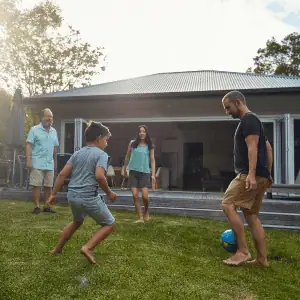 family playing outside a CT Shoreline home
